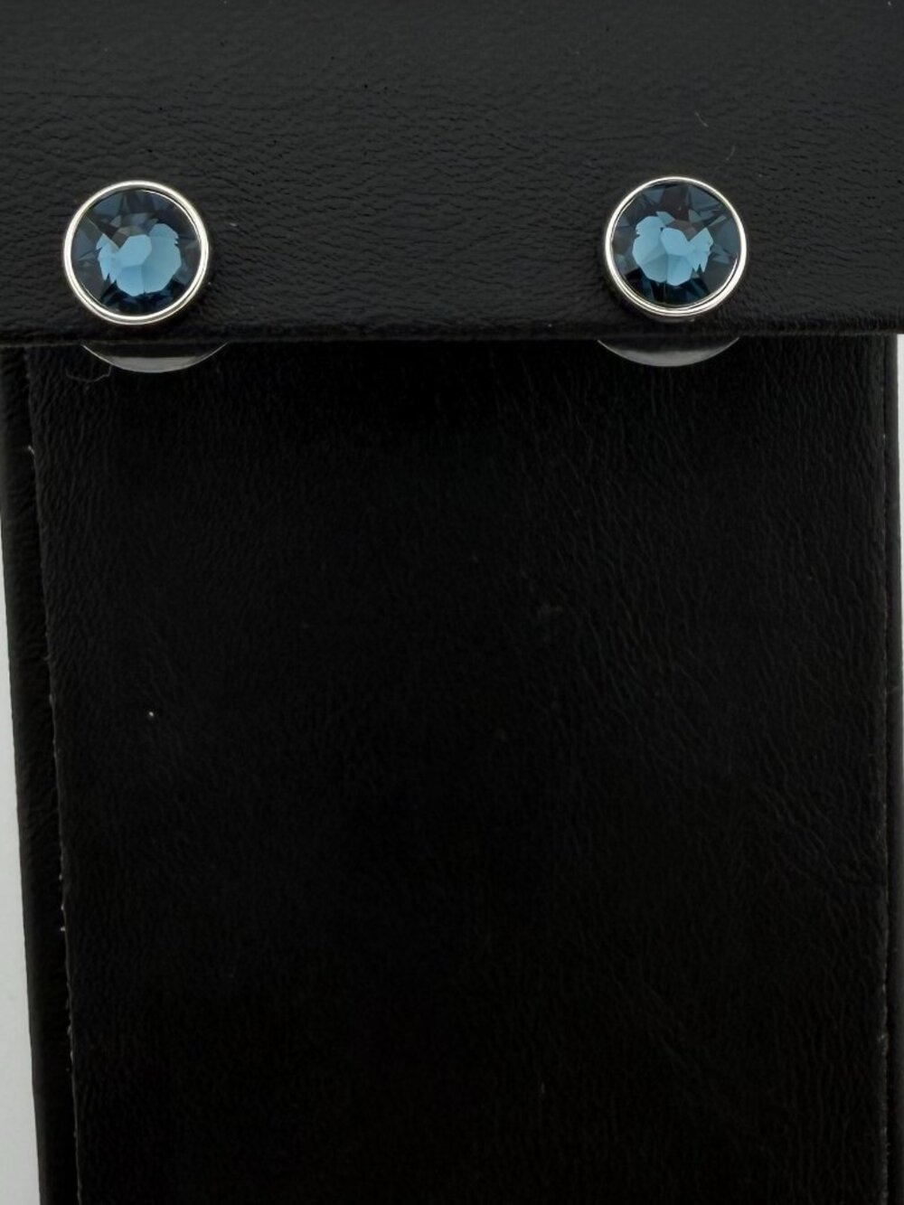 Touchstone Crystal by Swarovski Bezel Set Swizzle Stud Earrings MONTANA BLUE